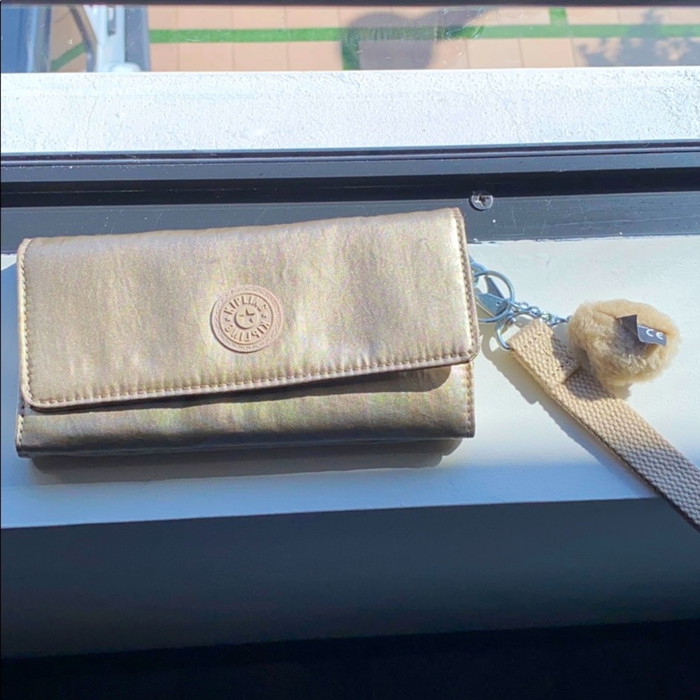 gold kipling wallet